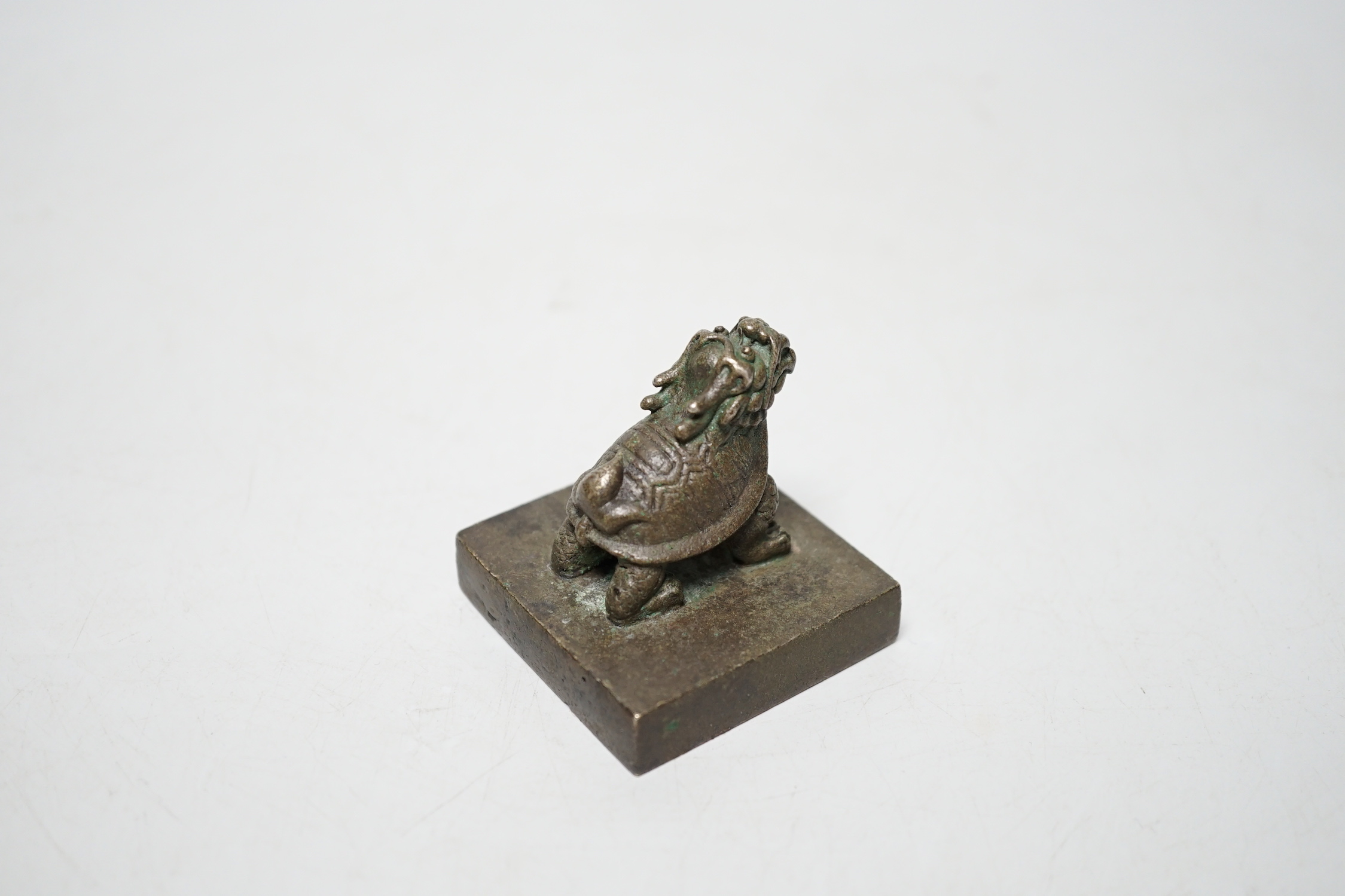 A Chinese bronze ‘Lónggui’ (dragon turtle) seal, 5cm